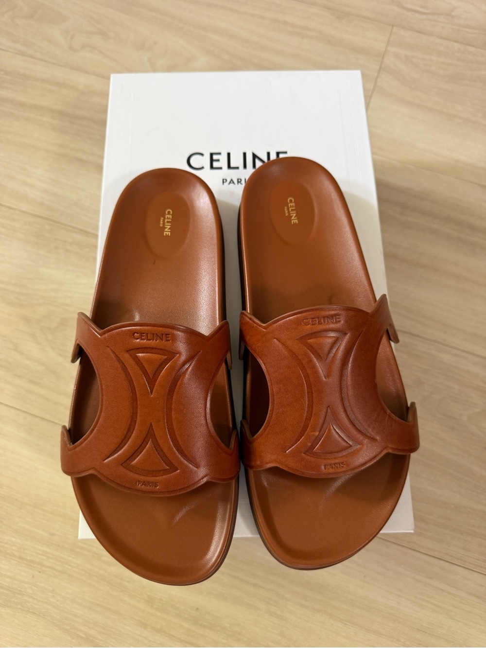 Celine 
TRIOMPHE SLIDE IN CALFSKIN - VEGETAL TANNING